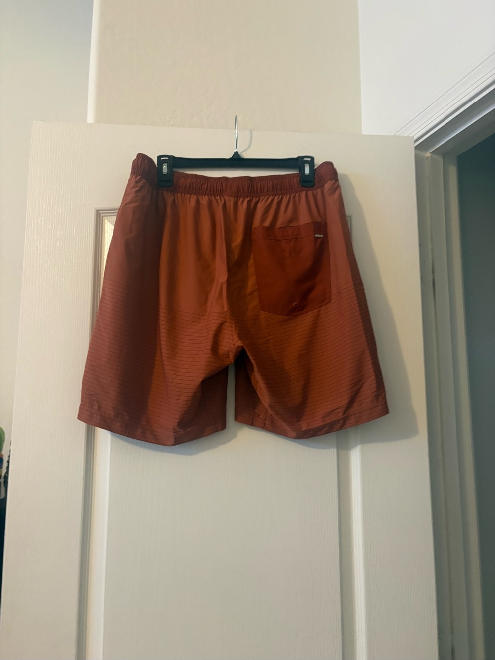 Vuori Men's Shorts in Rust Red with Heather Gray Lining